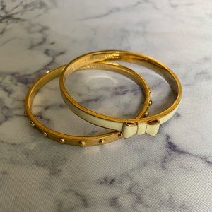 2 Kate Spade Gold Bangles. White Take a Bow and Gladiator Gold Ball bangles.